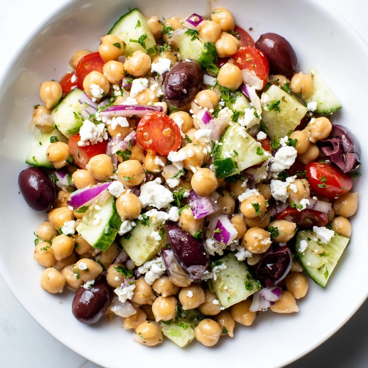 Bright image showcasing the delicious ingredients for Mediterranean Chickpea Salad, ready to be tossed and served.