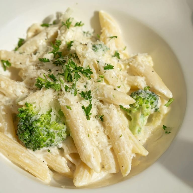 Delicious bowl of cream cheese garlic pasta: a comforting vegetarian dish, ready to be served.