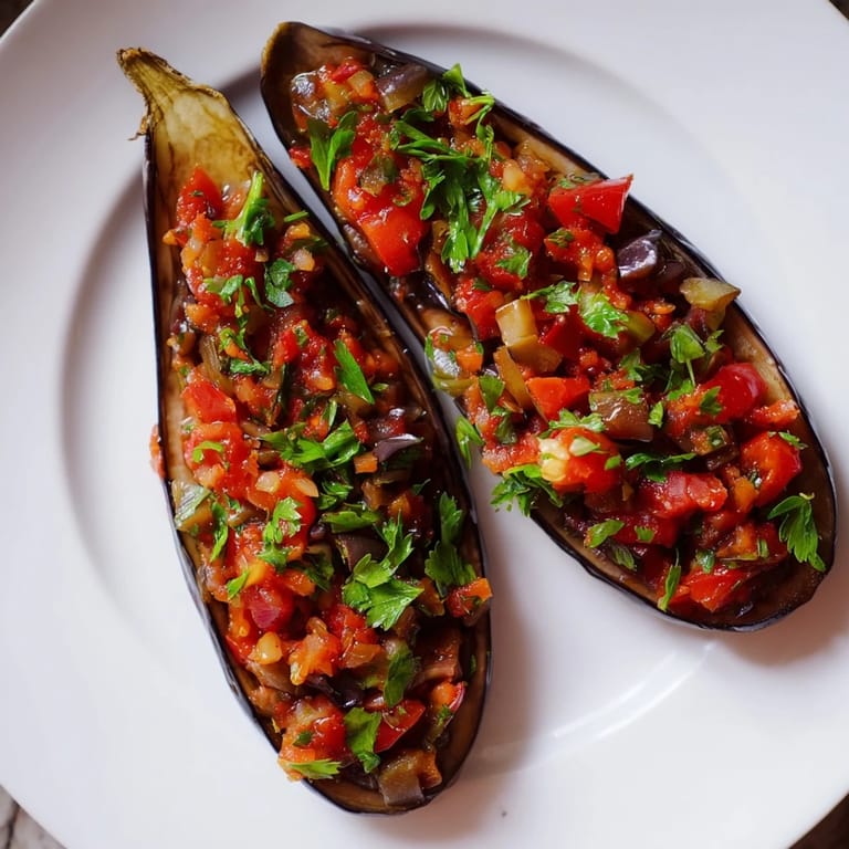 Enjoy a close-up of the delicious Imam Bayildi, the fragrant Turkish eggplant dish ready to devour.