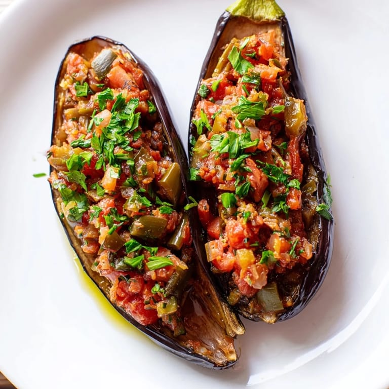 This photo highlights the beautifully browned eggplants of Imam Bayildi, perfect for a vegetarian meal.